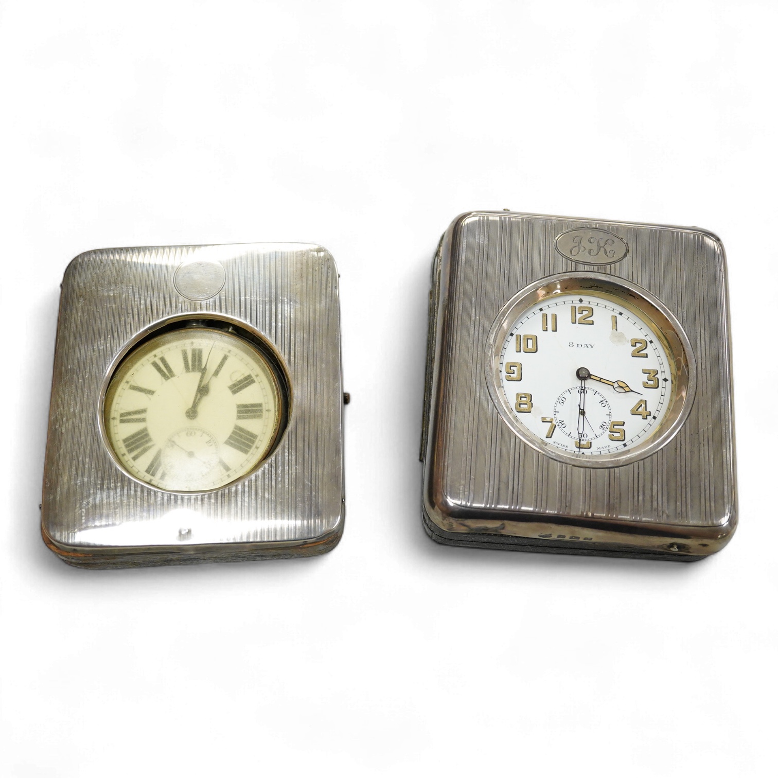 Two George V silver mounted travelling watch cases, both Birmingham, 1921, both containing chrome cased pocket watches. largest case 11.4cm.